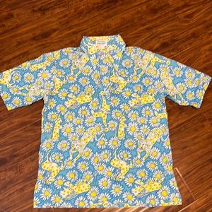 Vintage 1970's Lilly Pulitzer golf polo shirt. Yellow and blue daisy and animal.